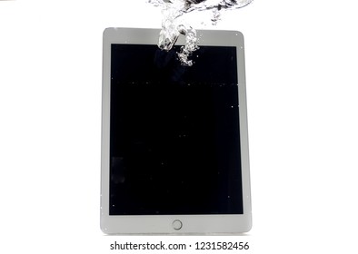 Modern Large Tablet Under Water, Bad Day, Not Photoshop