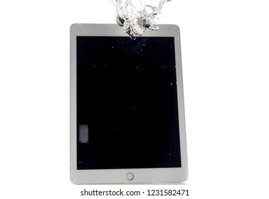 Modern Large Tablet Under Water, Bad Day, Not Photoshop