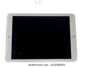 Modern Large Tablet Under Water, Bad Day, Not Photoshop