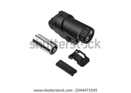Modern LED flashlight with weapon mount. Underbarrel tactical flashlight isolate on white background.