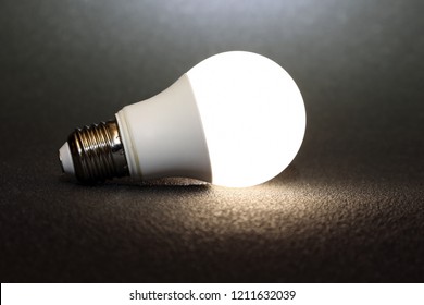 modern led lamp is turned on a dark background