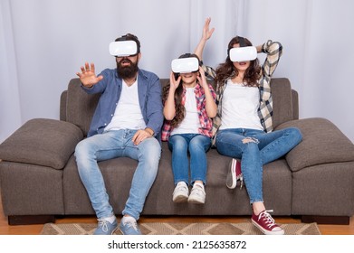 modern life. father mother and child wireless VR glasses. virtual reality family - Powered by Shutterstock