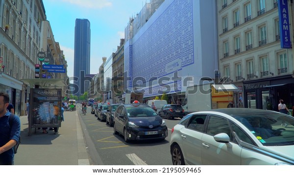 Modern life of people. Tourists. Shopping.\
Pishehody. Car traffic in the Romantic City Museum. Architecture.\
City streets in France Paris\
09.2022