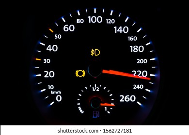 Modern light car mileage (dashboard, milage) isolated on a black background. New display of a modern car. Km/h.
