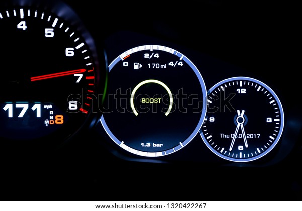 Modern light car mileage (dashboard, milage)\
isolated on a black background. New display of a modern car. 171\
mph. Boost.