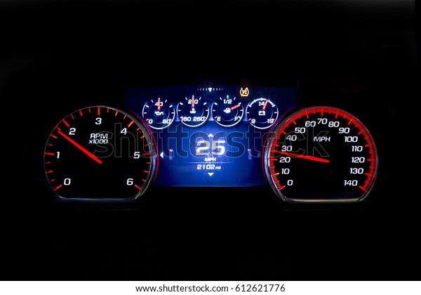 Modern\
light car mileage (dashboard, milage) isolated on a black\
background. New display of a modern car. 25\
mph.