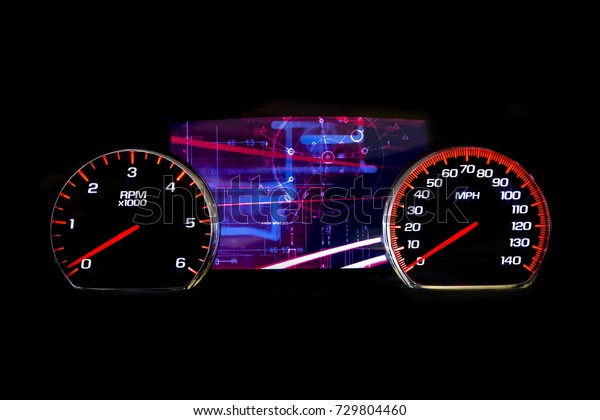 Modern light car mileage (dashboard, milage)\
isolated on a black background. New display of a modern car.\
Futuristic.