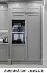 Modern Light Classical Kitchen Interior With Combination Oven, Microwave And Fridge