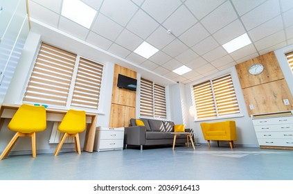 Modern Light Ward Of Maternity Hospital. Empty Sofa And Armchair In A Emergency Room. Full Length View