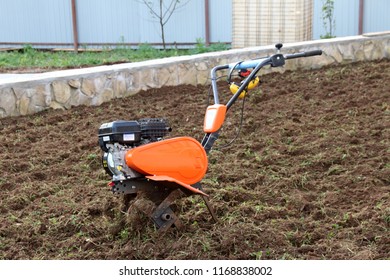 Modern Lightweight Tiller On Cultivated Soil Stock Photo 1168838002 ...