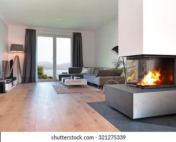 modern living room with fireplace and a view to the coast