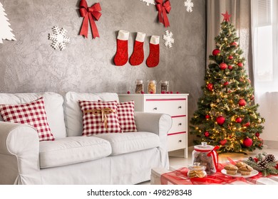 Modern Living Room In Grey And White With Christmas Tree And DIY Wall Decor