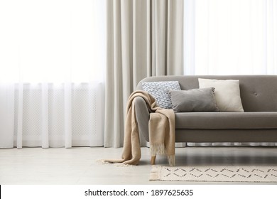 Modern living room interior with beautiful curtains on window - Shutterstock ID 1897625635