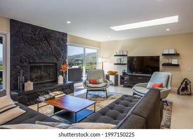Modern Living Room With Lava Rock Fireplace, Wine Country Home Interior
