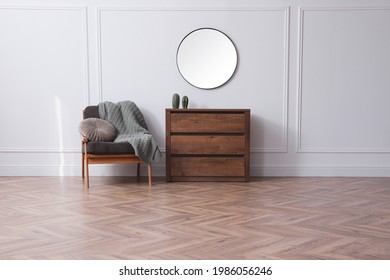 Modern living room with parquet flooring and stylish furniture - Shutterstock ID 1986056246