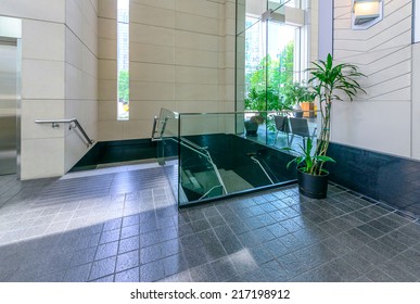 Modern Lobby With The Escalator, Hallway Of The Luxury Hotel, Shopping Mall, Business Center In Vancouver, Canada. Interior Design.