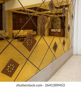 Modern lobby interior with decorative wall mirror panels featuring diamond-shaped wooden inlays. Elegant and symmetrical design ideal for hotels, offices, or upscale commercial spaces.