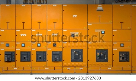 Modern low voltage electrical switchgear and power distribution panels installed in a commercial industrial facility for energy management and electrical infrastructure.