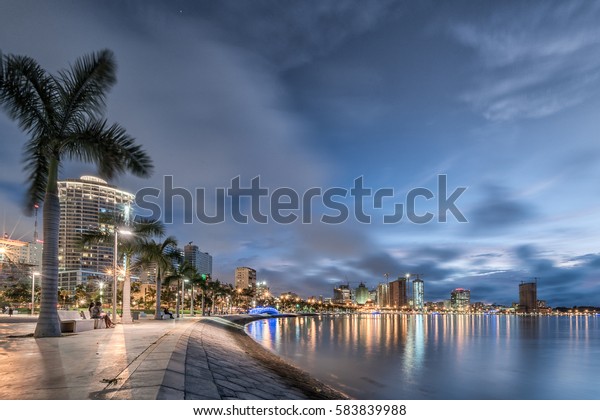 the modern\
Luanda\'s bay front walk at\
dusk\

