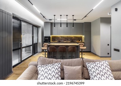 Modern Luxury Apartment With A Free Layout In A Loft Style In Gray And Dark Colors. Stylish Kitchen Area With An Island, Marble Countertop