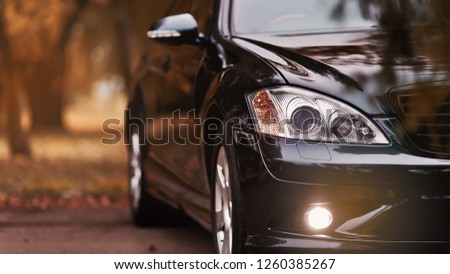 Modern luxury car close-up banner background. Concept of expensive, sports auto.