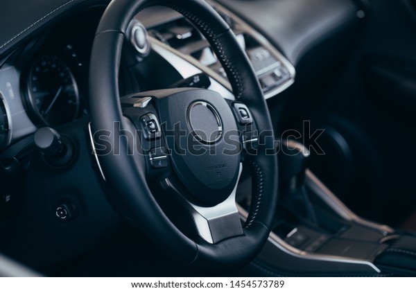 Modern Luxury car inside. Interior of\
prestige modern car. Modern car interior\
details