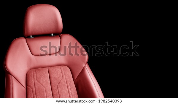 Modern luxury car red leather interior. Part of\
red perforated leather car seat details with white stitching.\
Interior of prestige car. Comfortable perforated leather seats.\
Perforated leather.