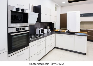 Modern luxury hi-tek black and white kitchen interior, clean design