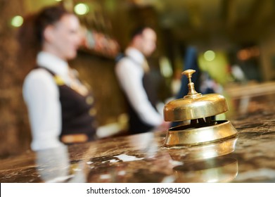Modern luxury hotel reception counter desk with bell - Shutterstock ID 189084500