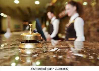 Modern luxury hotel reception counter desk with bell - Shutterstock ID 217868887