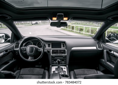 Modern Luxury Prestige Car Interior, Dashboard, Steering Wheel. Black Leather Interior.