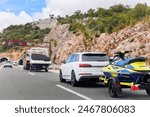 Modern luxury SUV towing aqua jet ski trailer carrier  river lake sea vacation mountain highway road summer light. Luxury rich fishing leisure recreation lifestyle. Service maintenance transportation