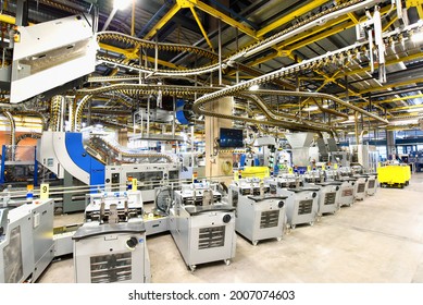 modern machines for transportation in a large print shop for production of newspapers and magazines - Shutterstock ID 2007074603