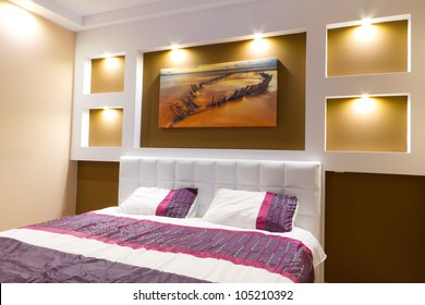 Modern master bedroom interior with picture of shipwreck on the wall (photo coming from my gallery)