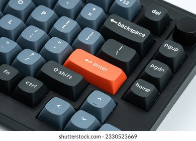 Modern mechanical keyboard for your computer. Gray keyboard with orange accent keys