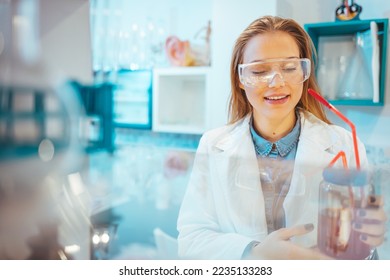 Modern Medical Research Laboratory: Female Scientist Working with Micro Pipette, Analysing Biochemicals Samples. Advanced Scientific Lab for Medicine, Microbiology Development.