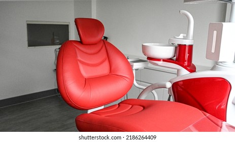 Modern Medical Special Equipment - Red Dentist Chair Isolated On Clinic Background