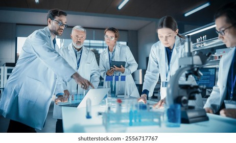 Modern Medicine Research Laboratory: Diverse Team of Smart Young Scientists Conducting an Experiment Under Senior Professor's Supervision. Advanced Microbiology Lab with High Tech Equipment - Powered by Shutterstock - Get 15% off with code: PIKWIZARD15