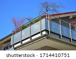 Modern Metal Balcony with high grade Privacy Protection Screen and metal Hand Rail at a residential Building