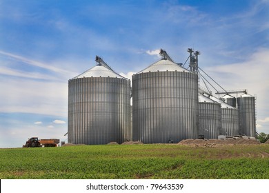 Modern metal silo with blue sky background