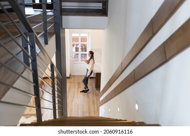 Modern metal stairway in scandinavian interior - Shutterstock ID 2060916116