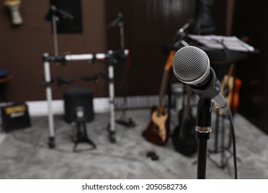 Modern Microphone At Recording Studio, Space For Text. Music Band Practice
