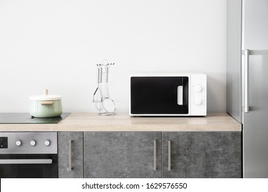 Modern Microwave Oven In Kitchen