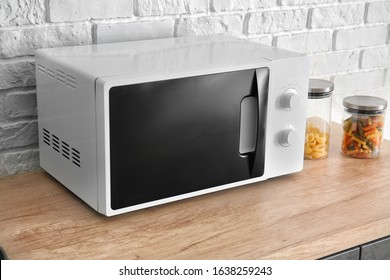 Modern Microwave Oven In Kitchen