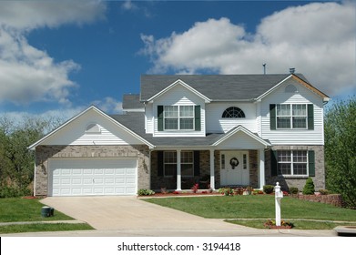 Modern Middle Class American Home With Clouds