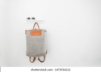 Modern and Minimal Bag Hanging on Hook, Scandinavian Entry Way, Copy Space, White Wall - Powered by Shutterstock