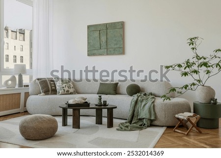 Similar – Image, Stock Photo Modern living room with natural light and cozy decor