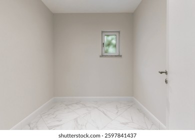 Modern minimalist space with tiny window. Small empty room with opened door