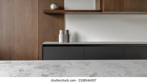 Modern minimalistic kitchen with black and wooden surfaces, marble kitchen island top and household appliances. Modern Concept For Interior Design And Architecture. - Shutterstock ID 2108546507