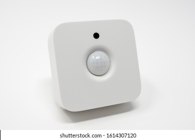 Modern Motion And Light Sensor. For Security Or Home Automation Purposes. Isolated On A White Background, Front View.